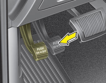 Kia Carnival: Parking brake  Foot type. To engage the parking brake, first apply the foot brake and then depress the