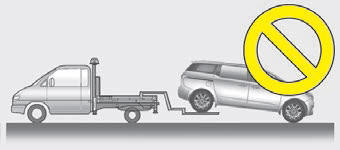 Kia Carnival: Towing service. 